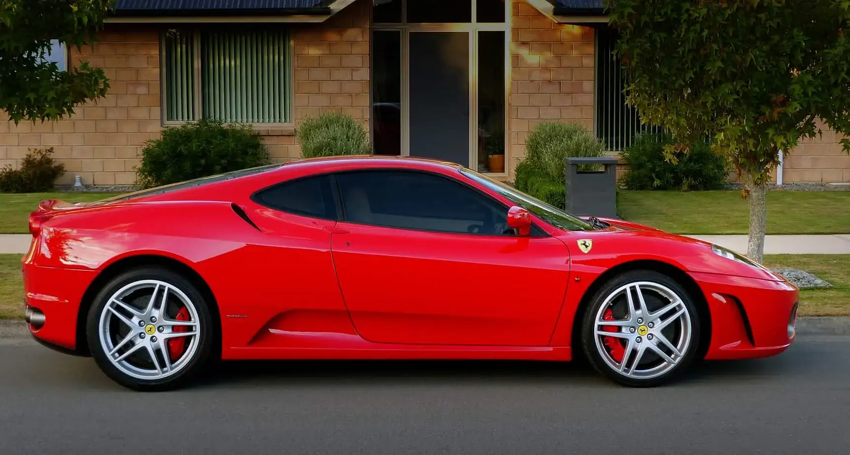 Richmond exotic car on flatbed soft-strap transport